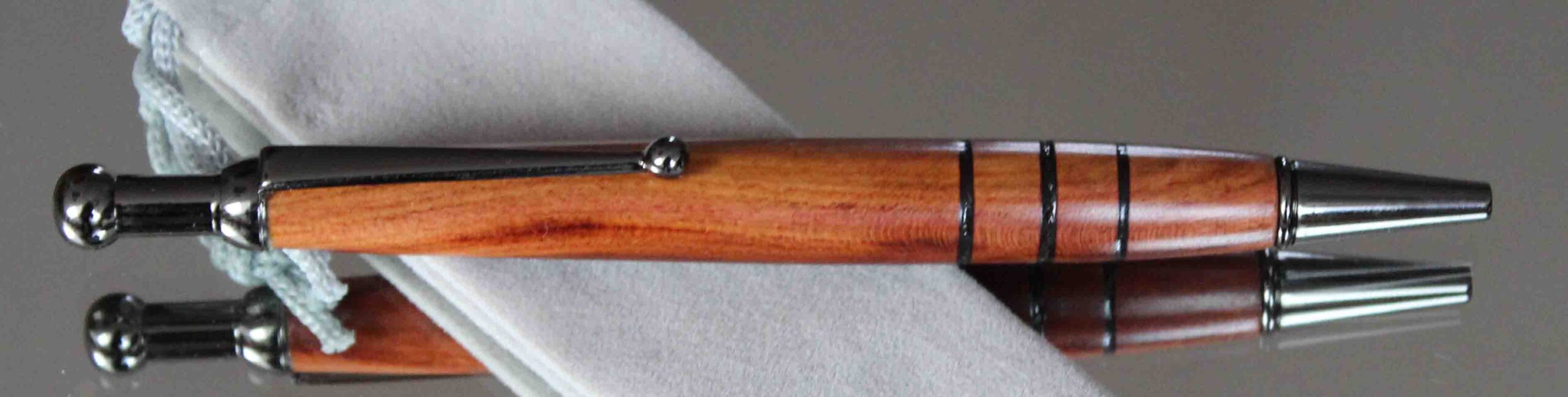 Zwetschgenholz - Druckkugelschreiber mit Kugelclip und Schellackpolitur